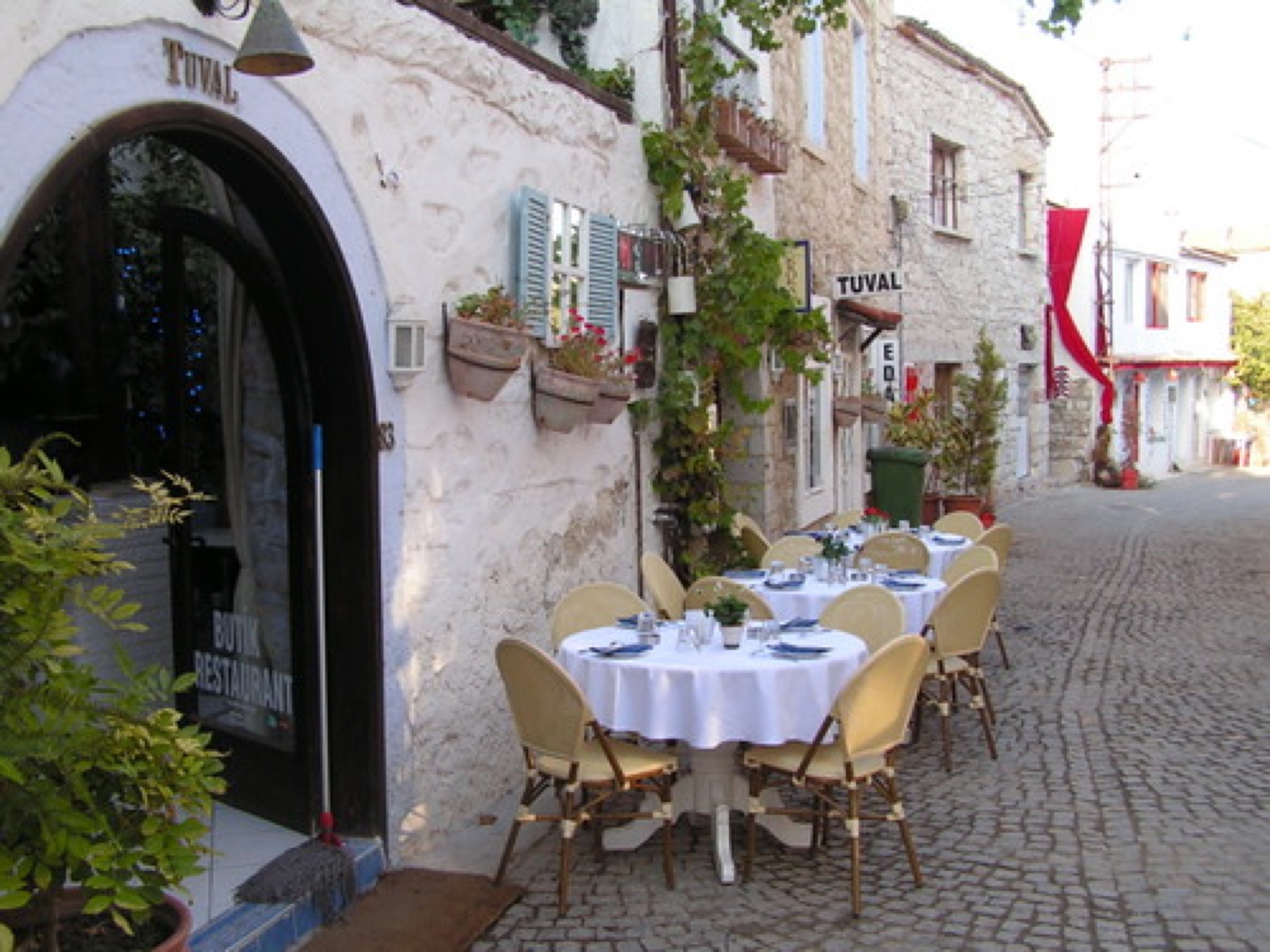 A table on a stone lane in Alaçatı